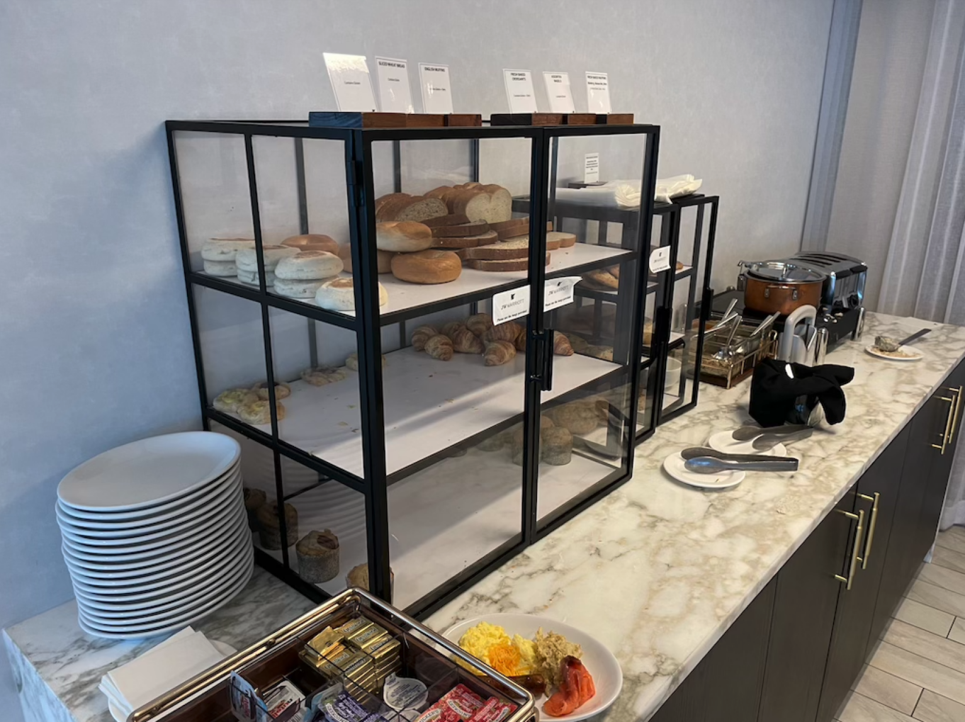 a kitchen with a shelf full of food